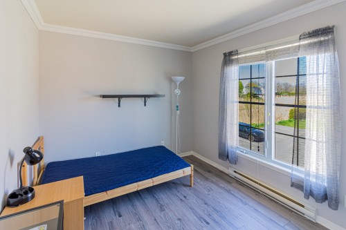 Chambre à coucher - 4-7475 Rue Lautrec, Brossard, QC - Indoor Photo Showing Other Room