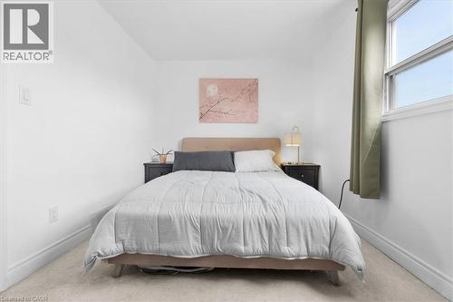 Bedroom featuring light-toned carpeting and white walls - 133 Frederick Avenue, Hamilton, ON - Indoor Photo Showing Bedroom