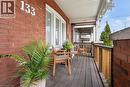 Brick exterior with white house numbers and multi-pane windows - 133 Frederick Avenue, Hamilton, ON  - Outdoor With Deck Patio Veranda With Exterior 
