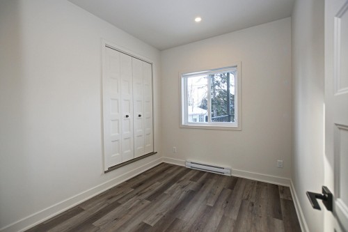 Chambre à coucher - 3176C Rue Roger, Sainte-Marthe-Sur-Le-Lac, QC - Indoor Photo Showing Other Room