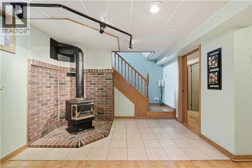 4 Tilbury Court, Hamilton, ON - Indoor Photo Showing Other Room With Fireplace