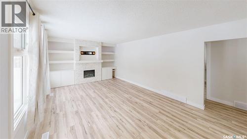 1511 8Th Avenue N, Regina, SK - Indoor With Fireplace
