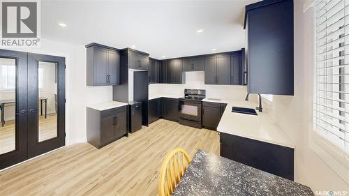 1511 8Th Avenue N, Regina, SK - Indoor Photo Showing Kitchen With Double Sink With Upgraded Kitchen