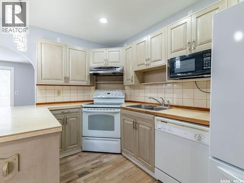 2518 Tomlinson Crescent, Saskatoon, SK - Indoor Photo Showing Kitchen With Double Sink