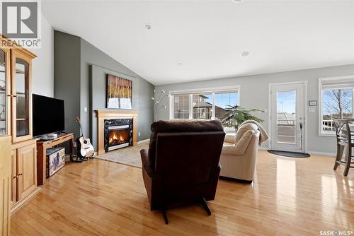 5 Corbin Bay, Grand Coulee, SK - Indoor Photo Showing Living Room With Fireplace