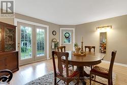 Family room, currently dining room, overlooks lake - 