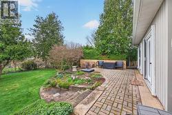 Indoor and Outdoor living converge on this patio - 
