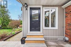 Back door to fully fenced yard and garage door - 