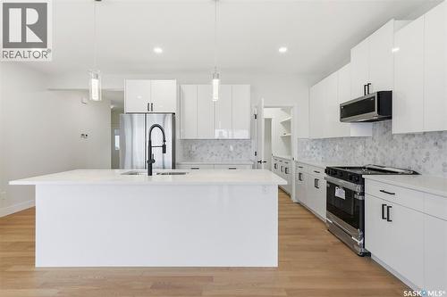 335 Sharma Crescent, Saskatoon, SK - Indoor Photo Showing Kitchen With Upgraded Kitchen