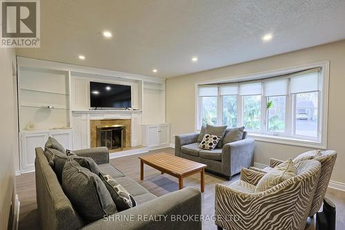 127 Odessa Avenue, London South (South O), ON - Indoor Photo Showing Living Room With Fireplace