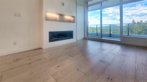 808-2000 Hannington Rd, Langford, BC - Indoor Photo Showing Living Room With Fireplace