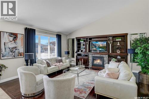 4839 Mazinke Crescent, Regina, SK - Indoor Photo Showing Living Room With Fireplace