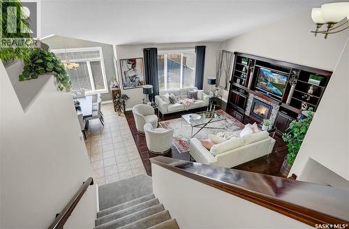 4839 Mazinke Crescent, Regina, SK - Indoor Photo Showing Living Room With Fireplace