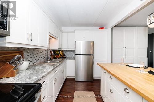 Stainless Steel appliance - 307 - 6 Westlake Lane, St. Catharines (Lakeport), ON - Indoor Photo Showing Kitchen With Double Sink