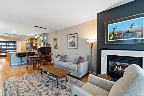 C02-38 Front St, Nanaimo, BC - Indoor Photo Showing Living Room With Fireplace