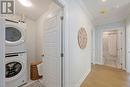 Laundry Room w full size front load washer dryer - 203 - 1560 Upper West Avenue, London South (South B), ON  - Indoor Photo Showing Laundry Room 