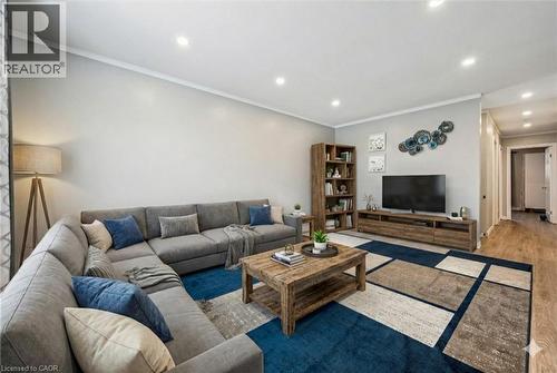 Virtually staged living room. - 263 The Country Way, Kitchener, ON - Indoor Photo Showing Living Room