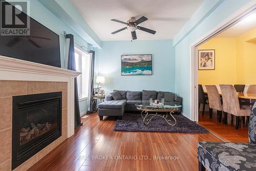 66 Springvalley Crescent, Hamilton, ON - Indoor Photo Showing Living Room With Fireplace