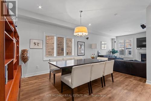 5142 Ancient Stone Avenue, Mississauga, ON - Indoor Photo Showing Dining Room With Fireplace