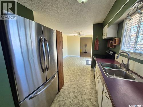 Key West Quarter, Ogema, SK - Indoor Photo Showing Kitchen With Double Sink