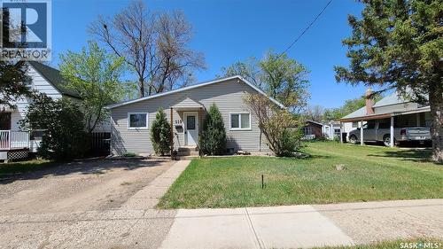 215 Mergens Street, Weyburn, SK - Outdoor With Deck Patio Veranda With Facade