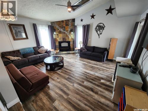 215 Mergens Street, Weyburn, SK - Indoor Photo Showing Living Room With Fireplace