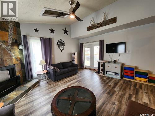 215 Mergens Street, Weyburn, SK - Indoor Photo Showing Living Room With Fireplace