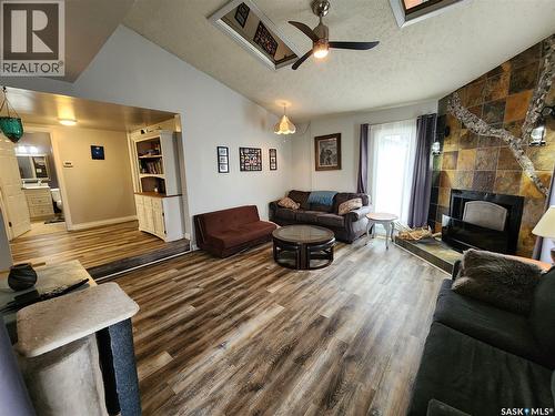 215 Mergens Street, Weyburn, SK - Indoor Photo Showing Living Room With Fireplace