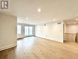 2nd floor loft area with walk-out to balcony - 