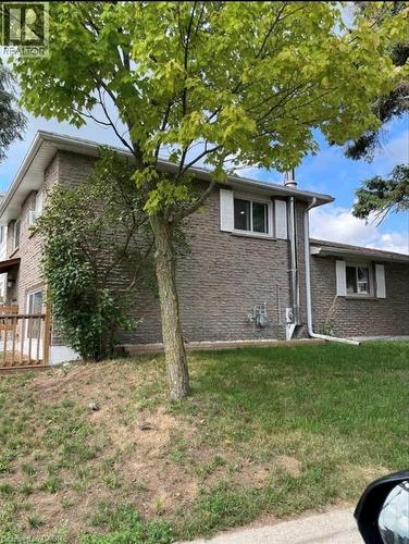 Brick exterior with white window trim and shutters - 744 Parkview Crescent, Cambridge, ON - Outdoor