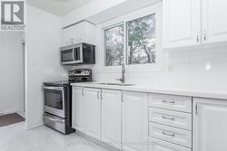 Plenty of workspace for cooking and baking. - 