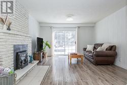 Patio doors lead directly to the backyard. - 