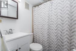 A full bathroom serves the lower level. - 