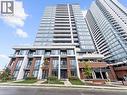 Modern high-rise residential building featuring a glass facade and multiple balconies - 5 Wellington Street S Unit# 904, Kitchener, ON  - Outdoor With Facade 