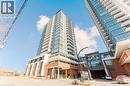 Modern high-rise residential building featuring extensive glass curtain walls and individual balconies - 5 Wellington Street S Unit# 904, Kitchener, ON  - Outdoor With Facade 