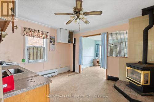 1062 West Avenue, Mississauga, ON - Indoor Photo Showing Other Room With Fireplace