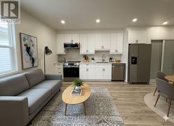 REAR - 67 WAYLAND AVENUE  Toronto, ON M4E 3C8