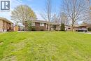 Brick exterior residence featuring a front yard with mature trees - 45 Driftwood Drive, Brantford, ON  - Outdoor 