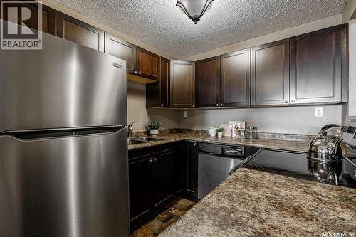 8 2707 7Th Street E, Saskatoon, SK - Indoor Photo Showing Kitchen With Stainless Steel Kitchen With Double Sink