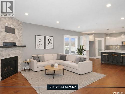 551 6Th Avenue Se, Swift Current, SK - Indoor Photo Showing Living Room With Fireplace
