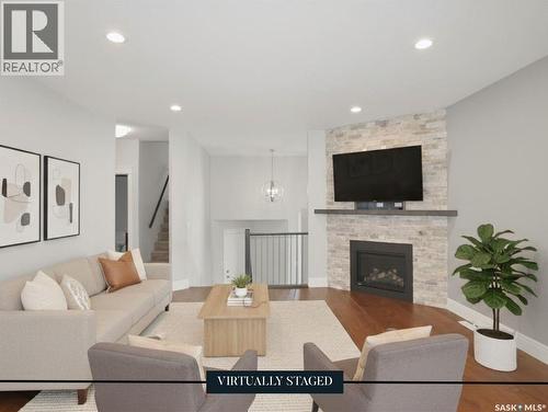 551 6Th Avenue Se, Swift Current, SK - Indoor Photo Showing Living Room With Fireplace