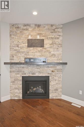 551 6Th Avenue Se, Swift Current, SK - Indoor Photo Showing Living Room With Fireplace