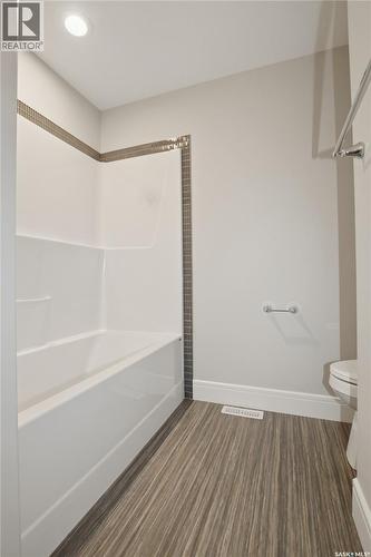 551 6Th Avenue Se, Swift Current, SK - Indoor Photo Showing Other Room