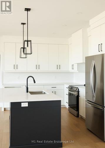 74 Bedell Drive, Mapleton, ON - Indoor Photo Showing Kitchen