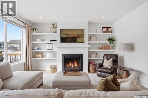 606 Delainey Road, Saskatoon, SK - Indoor Photo Showing Living Room With Fireplace