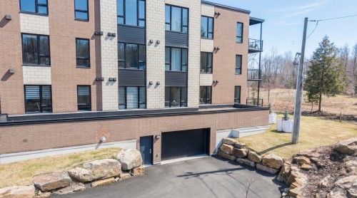 Garage - 106-1320 Rue Custine, Saint-Jérôme, QC - Outdoor