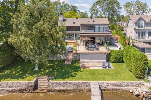 Façade - 570 Rue Lakeshore, Beaconsfield, QC - Outdoor With Body Of Water With Deck Patio Veranda