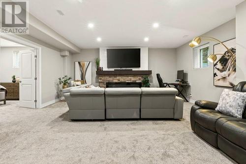 10 - 2848 King Street, Lincoln, ON - Indoor Photo Showing Basement With Fireplace