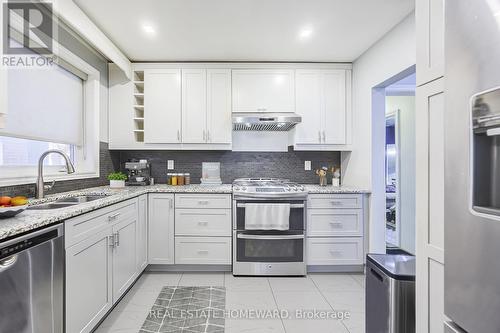 Virtually Staged - 4 Moorecroft Crescent, Toronto, ON - Indoor Photo Showing Kitchen With Double Sink With Upgraded Kitchen