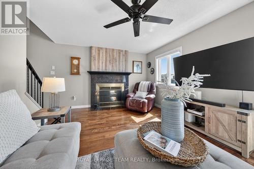 161 Springwater Drive, Ottawa, ON - Indoor Photo Showing Living Room With Fireplace